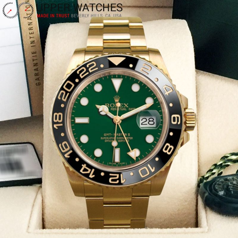 yellow gold gmt green dial