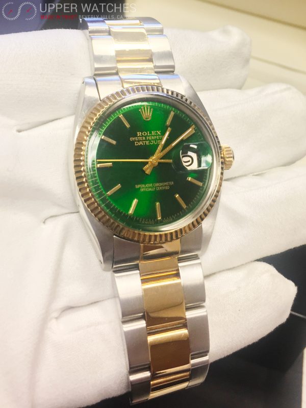 green and silver rolex