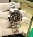 04-rolex-116520-unworn-plastic-black-dial