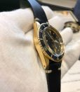 07-rolex-1680-gold-submariner-black-dial-faded-bezel